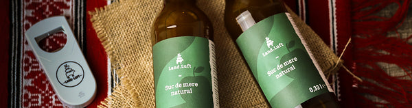 Banner Land.Luft cu suc de mere 100% natural, presat la rece și ambalat în sticlă pentru prospețime